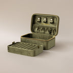 The Rectangle Velvet Jewelry Box in olive green features compartments, ring slots, and earring holders inside its open rectangular design.