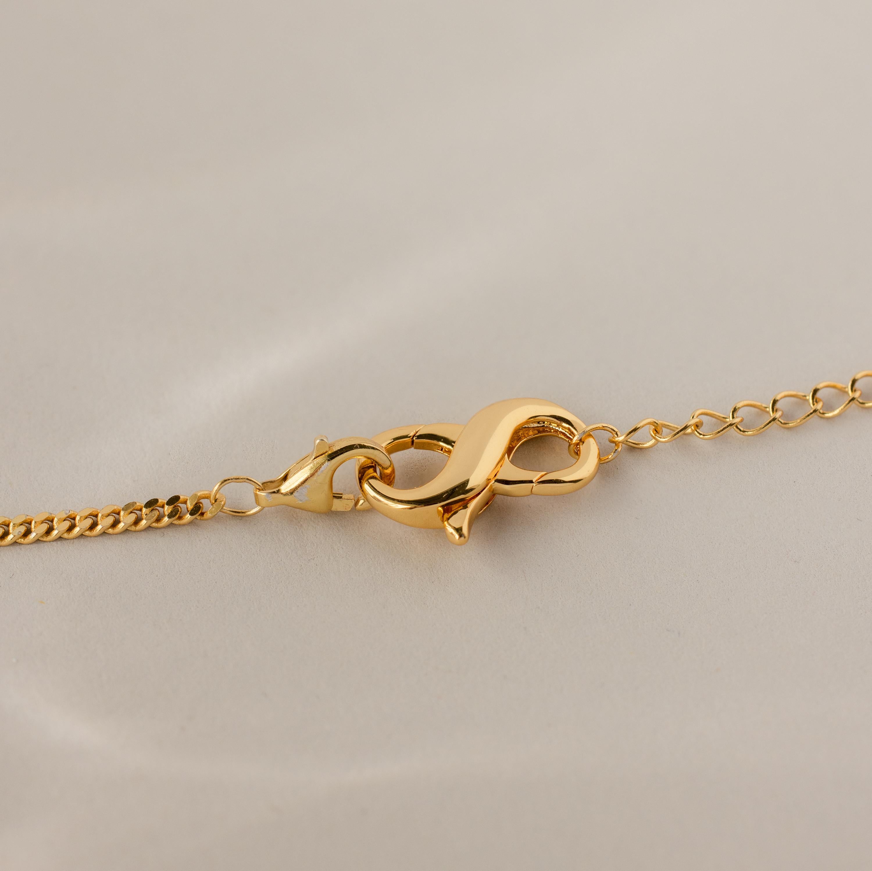 Close-up of the Multipurpose Lobster Clasp Extender Set in 18K Gold displayed on a neutral background.