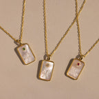 The Pearl Zodiac Birthstone Necklace in Sterling Silver features a chic zodiac pendant with a gemstone accent—perfect personalized jewelry for any necklace collection.