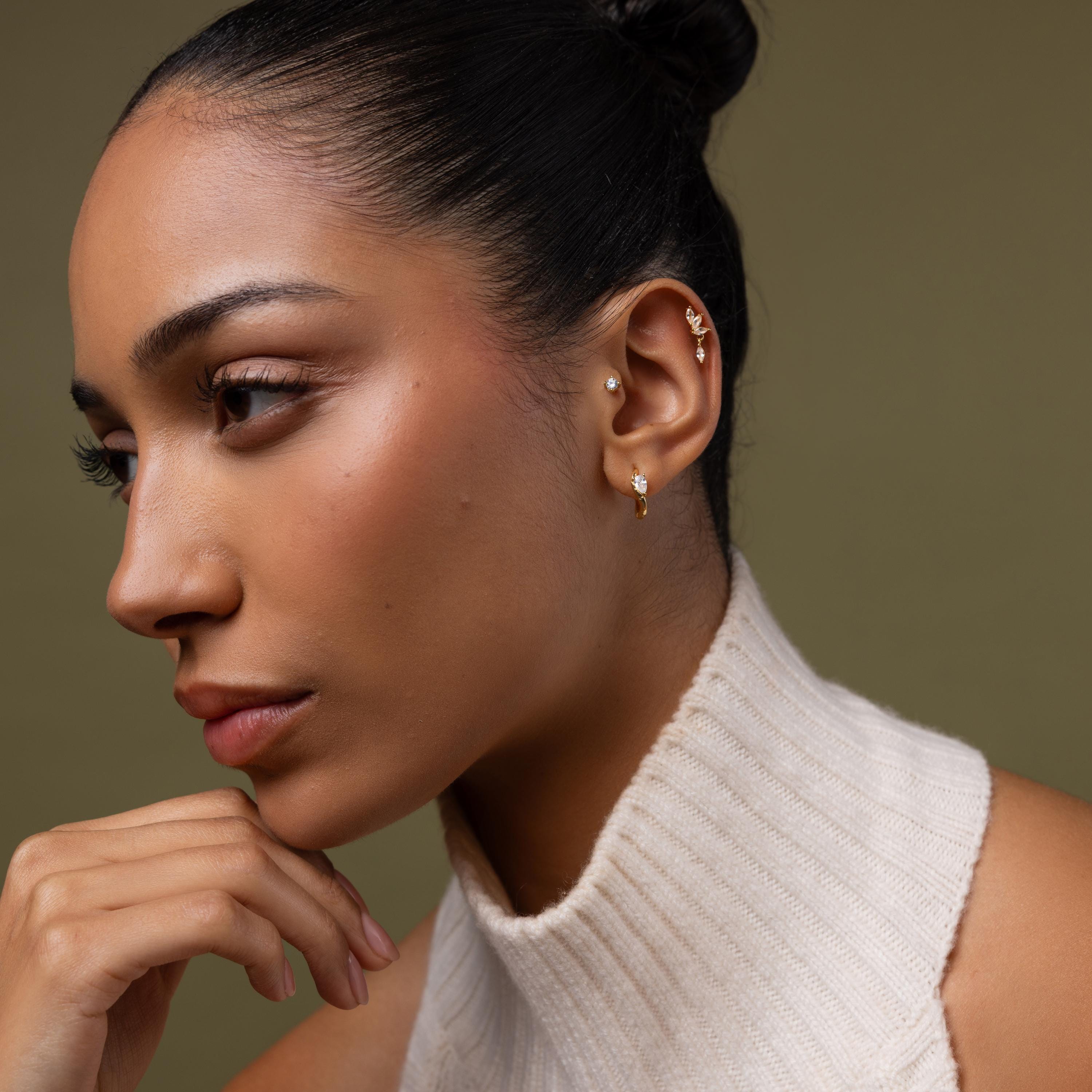 Model showcasing our Hammered Diamond Teardrop Hoops, styled with our Marquise Diamond Drop Studs