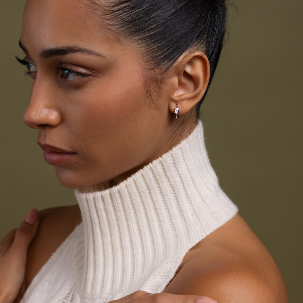 Model wearing our Hammered Diamond Teardrop Hoops in Silver