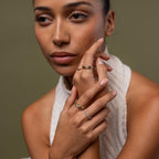 Model wearing our Diamond Wave Band, styled with our Duo Form Rings, Birthstone Curve Ring and Diamond Bezel Tennis Ring