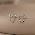 Flatlay of our Opal & Diamond Chain Studs