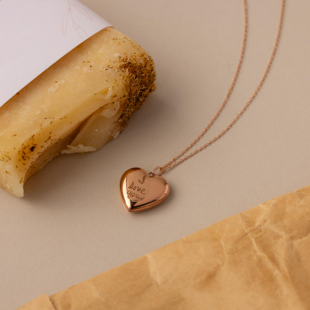 Close up of our Handwriting Heart Locket Necklace in Rose Gold