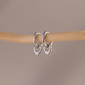 Close up of our Tiny Teardrop Huggies in White Gold