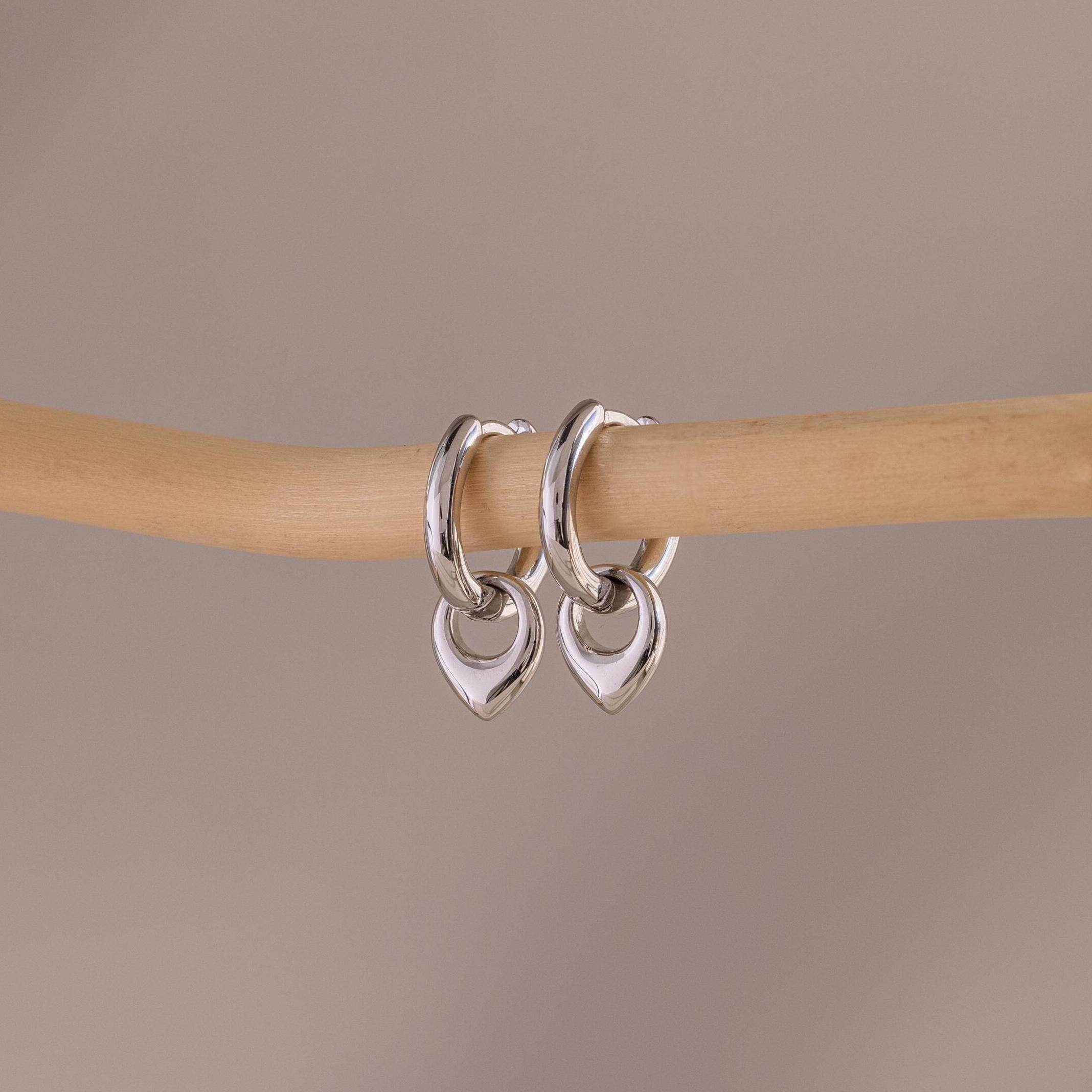 Close up of our Tiny Teardrop Huggies in White Gold