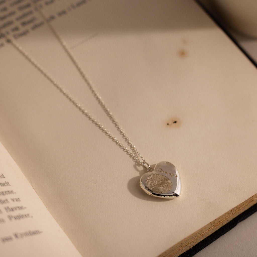 Close up of our Fingerprint Heart Locket Necklace in Sterling Silver