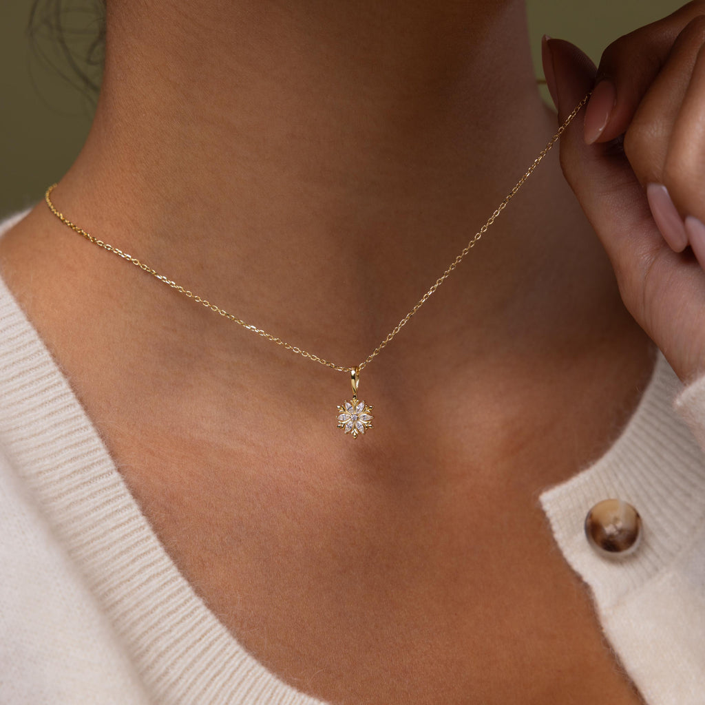 Model wearing our Diamond Poinsetta Pendant Necklace in Gold