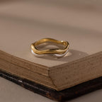 Flatlay of our Mixed Metal Wave Ring Set