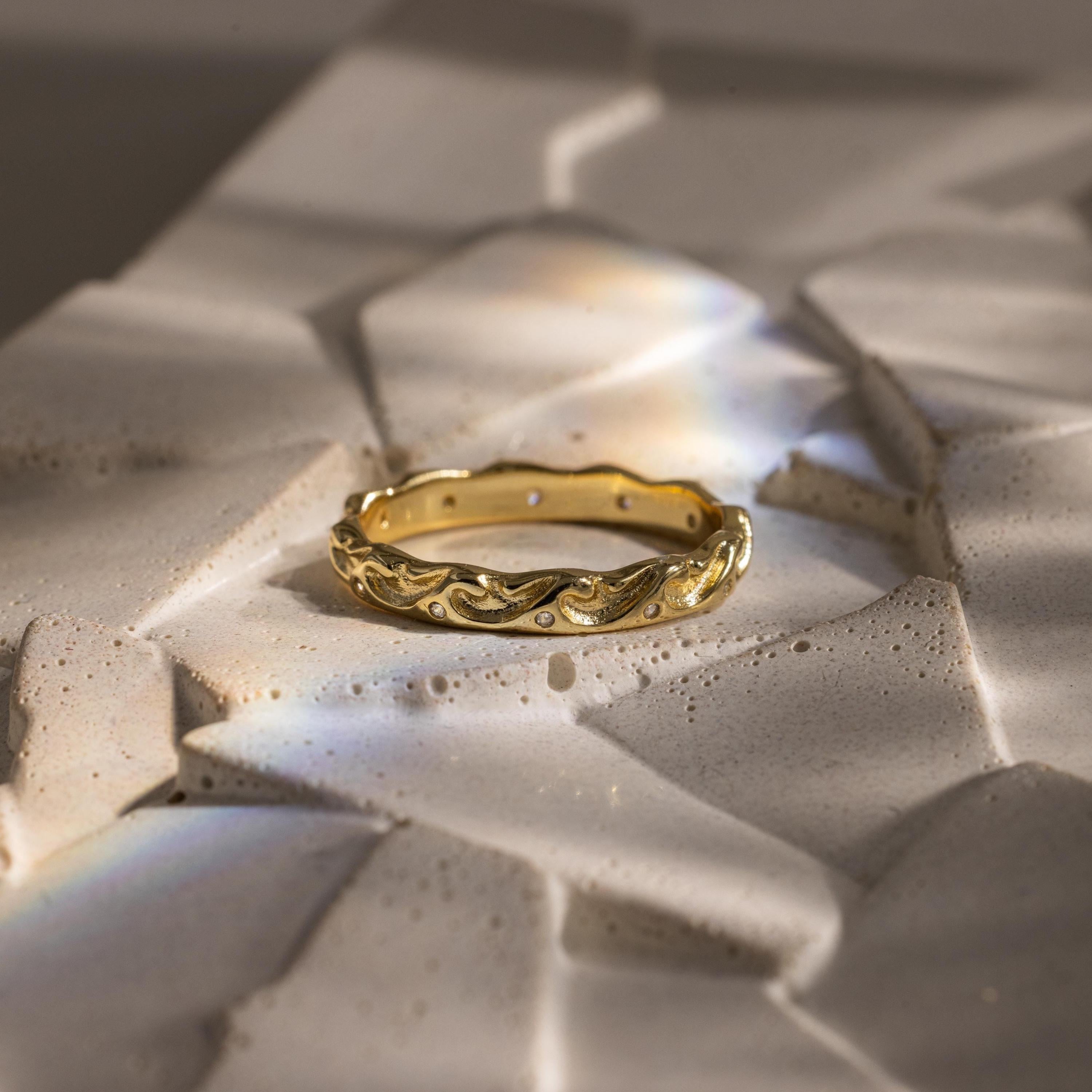 Closeup flatlay of our Diamond Wave Band