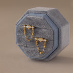 Flatlay of our Opal & Diamond Chain Studs in a Blue Velvet Jewelry Box