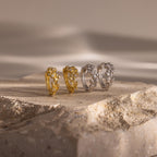 Close up image of 2 pairs of our Diamond Leaf Hoops in Gold and Silver