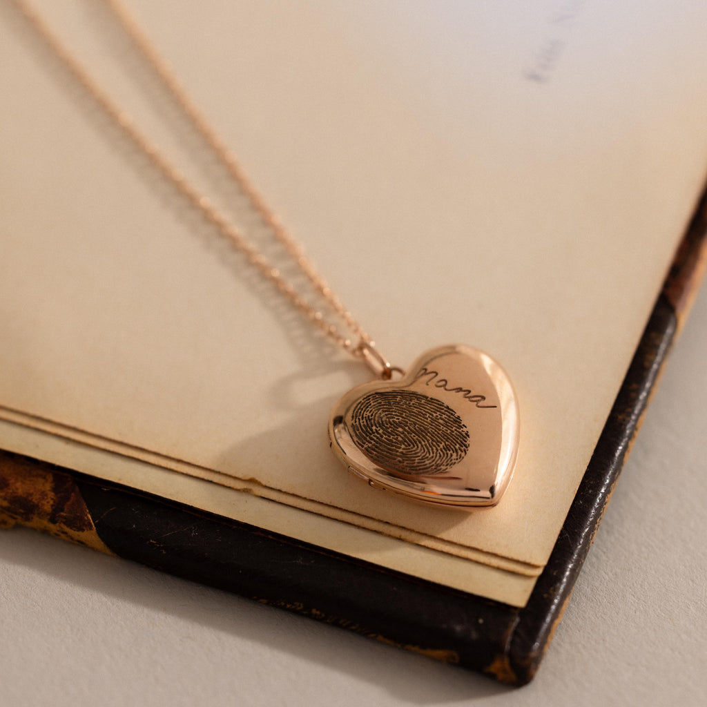 Close up of our Fingerprint Heart Locket Necklace in Rose Gold