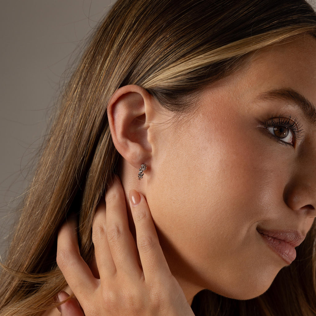 Model wearing our Diamond Leaf Hoops in Sterling Silver