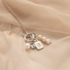Mother of Pearl Initial Charm in Silver