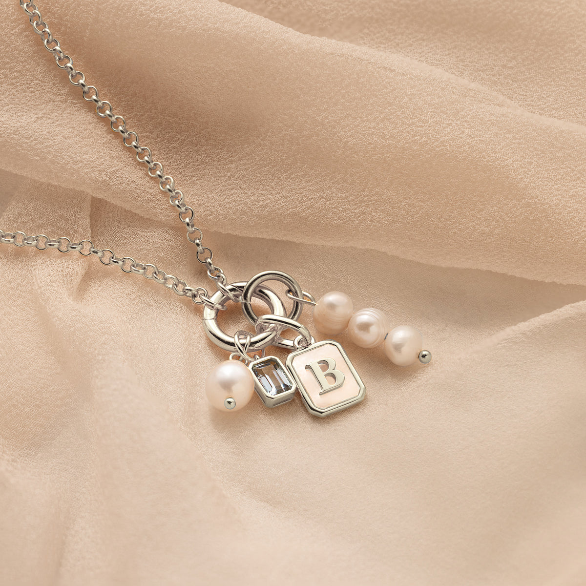 Mother of Pearl Initial Charm in Silver