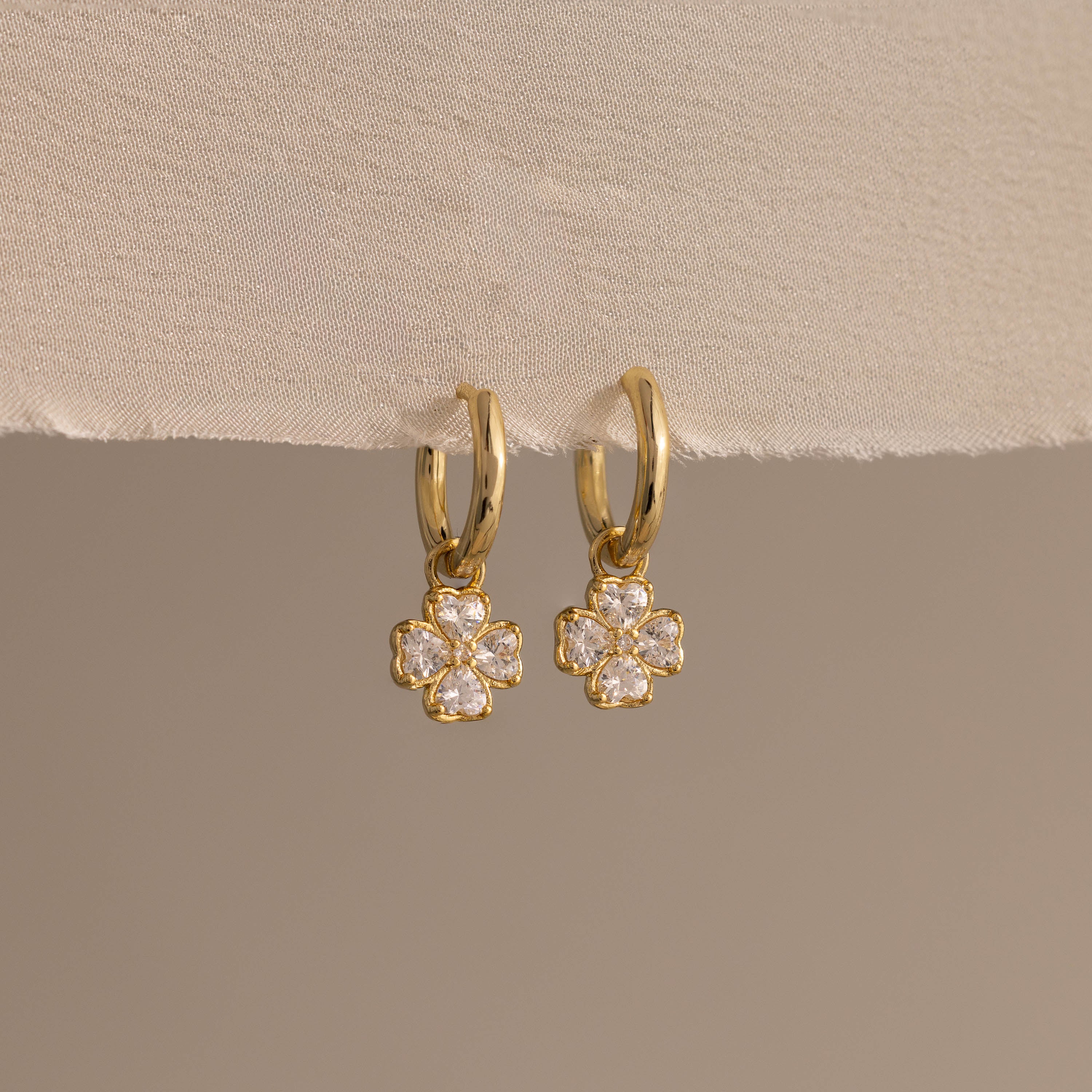 Diamond Clover Huggies in 18K Gold