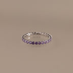Anillo Eternity con piedra natal de tenis 