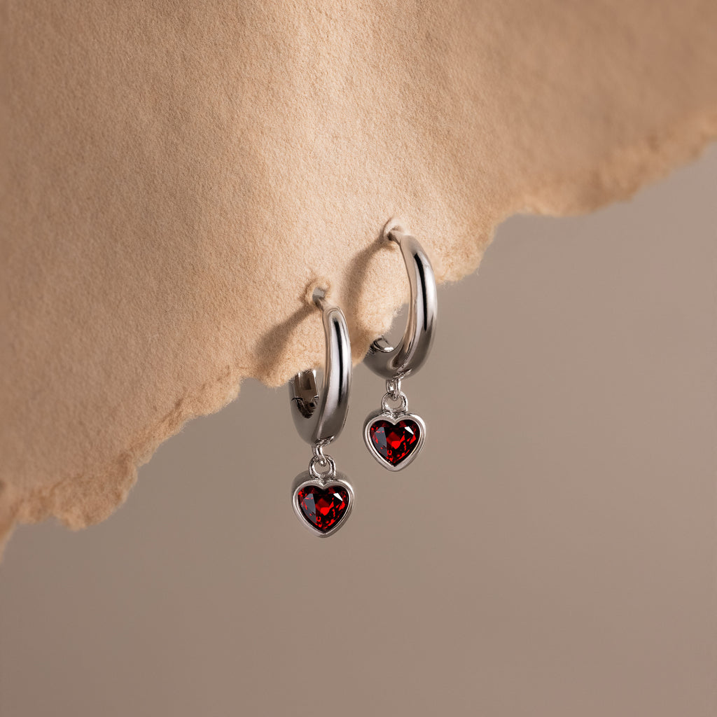 Dangling Garnet Heart Huggies in Silver
