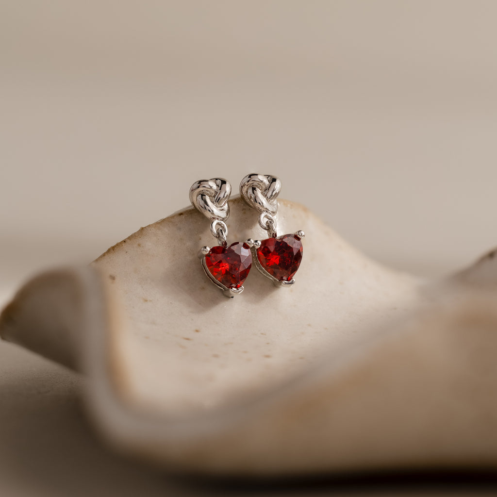 Garnet Heart Knot Studs in Silver