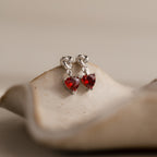 Garnet Heart Knot Studs in Silver