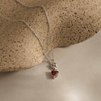 Garnet Heart Knot Necklace in Silver