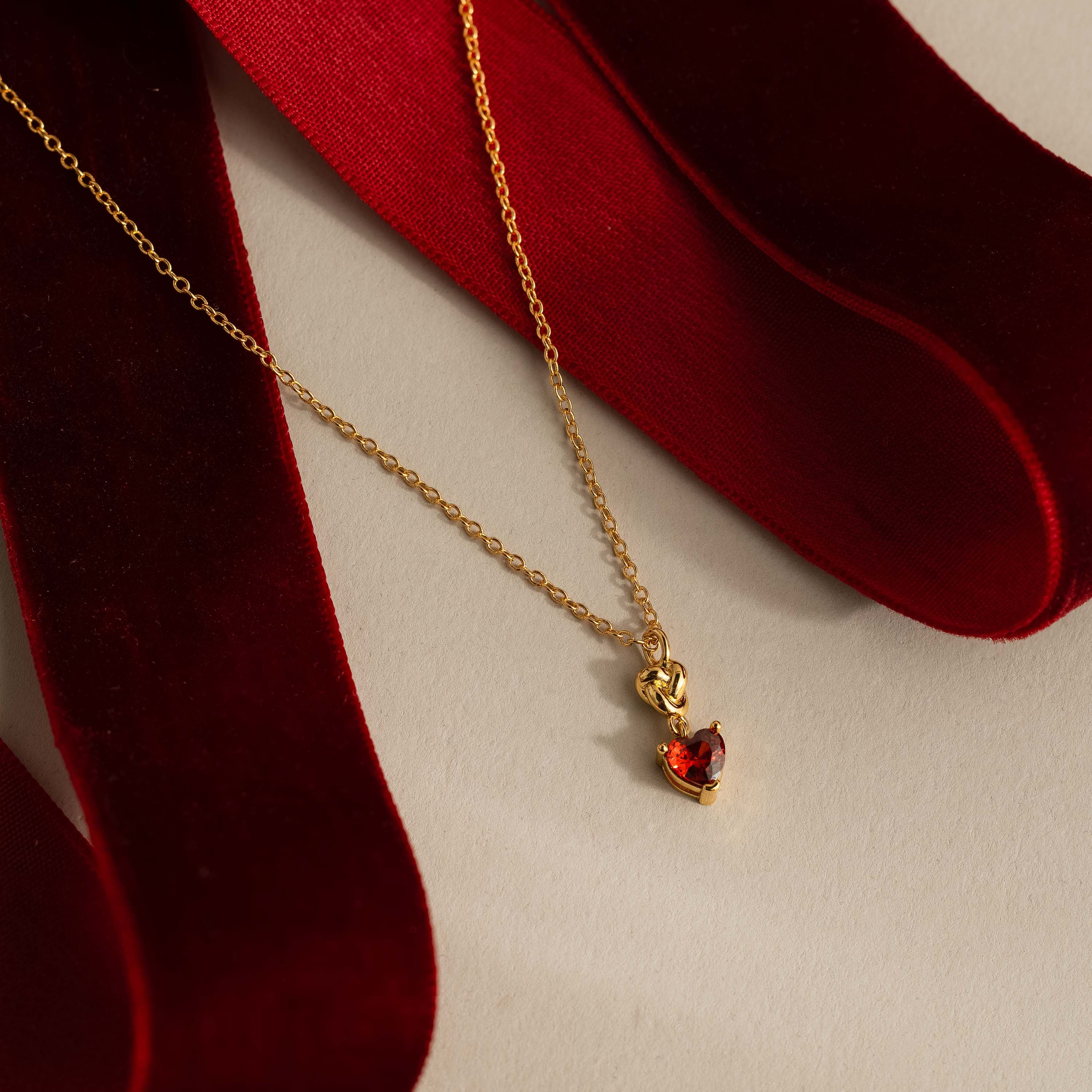 Garnet Heart Knot Necklace in 18K Gold