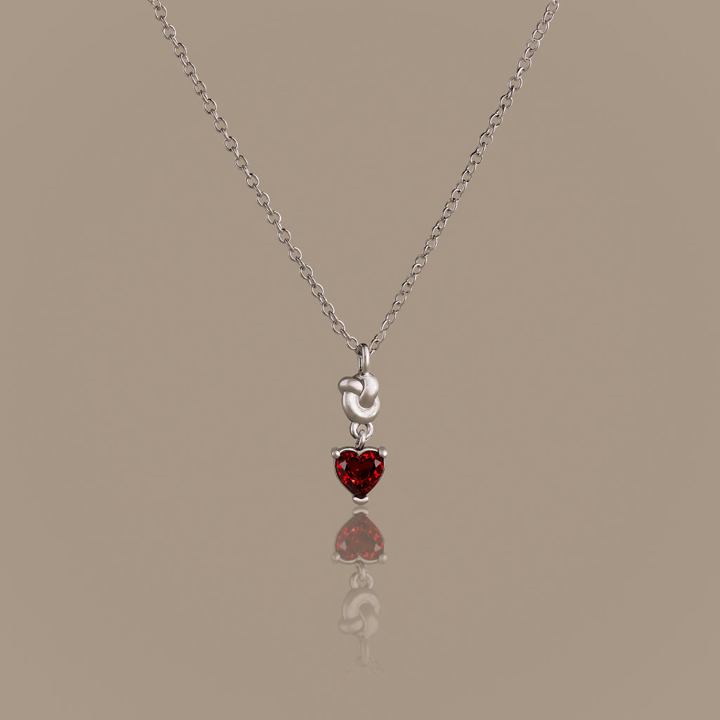 Garnet Heart Knot Necklace in Silver