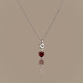 Garnet Heart Knot Necklace in Silver