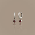 Dangling Garnet Heart Huggies in Silver