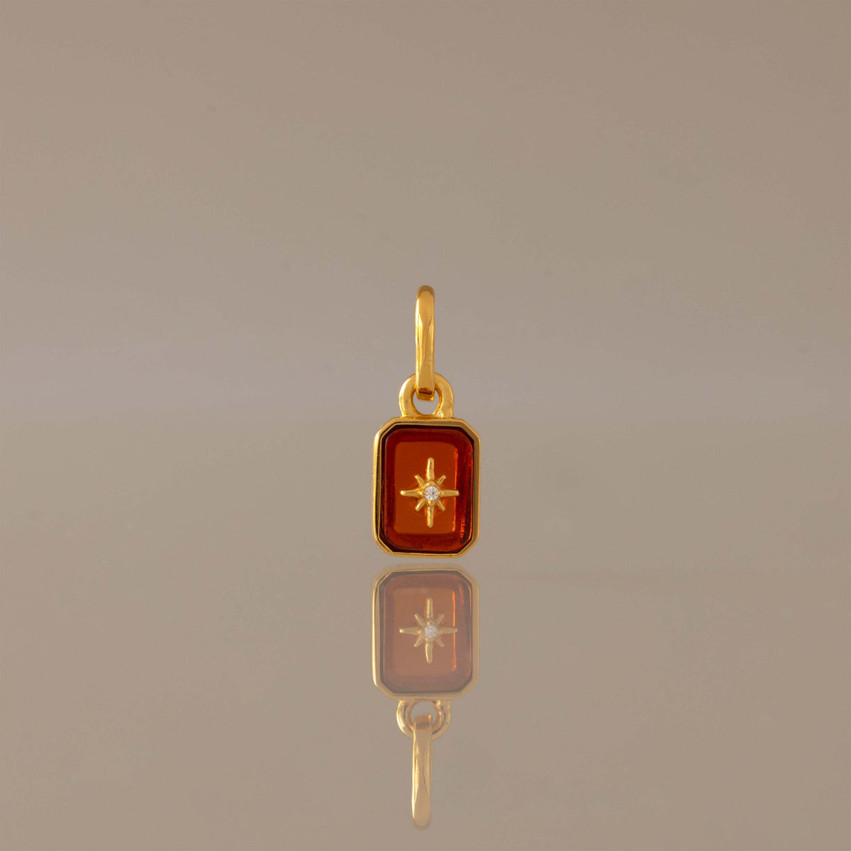North Star Garnet Charm