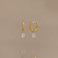 Diamond Raindrop Huggies in 18K Gold