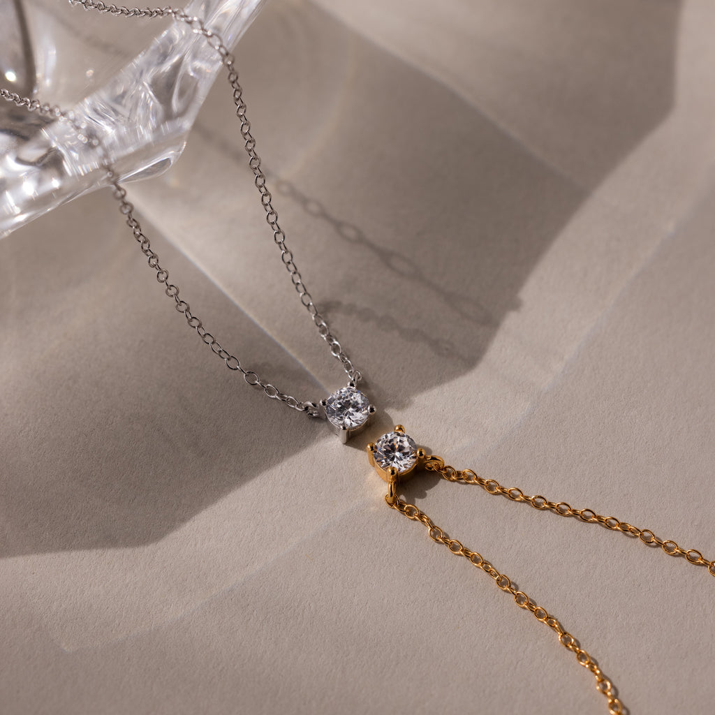 The Dainty Diamond Necklace, available in silver and gold with a solitaire diamond, makes a perfect, delicate Christmas gift.
