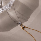 The Dainty Diamond Necklace, available in silver and gold with a solitaire diamond, makes a perfect, delicate Christmas gift.