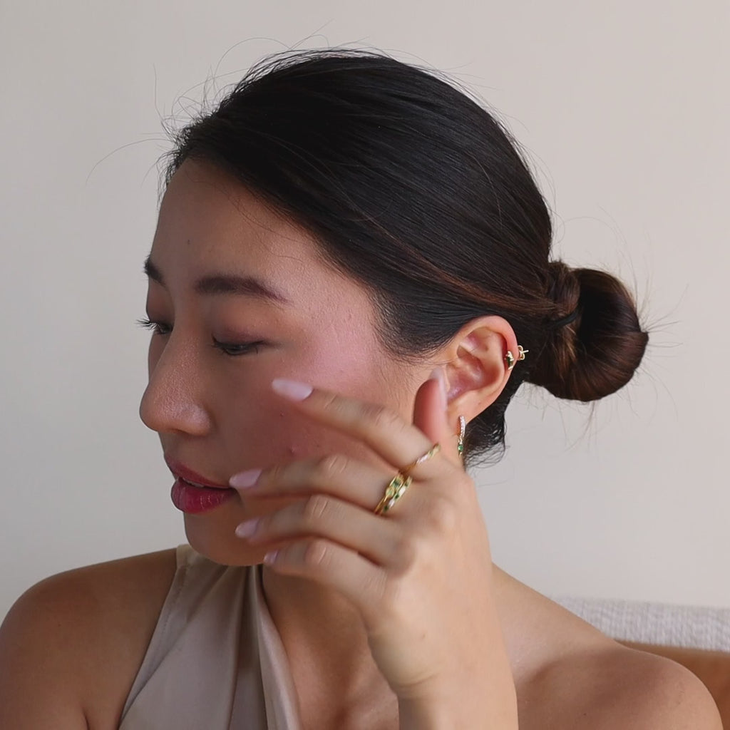 Aros de serpiente con pavé esmeralda