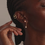 Clous d'oreilles en perles roses en or 18 carats