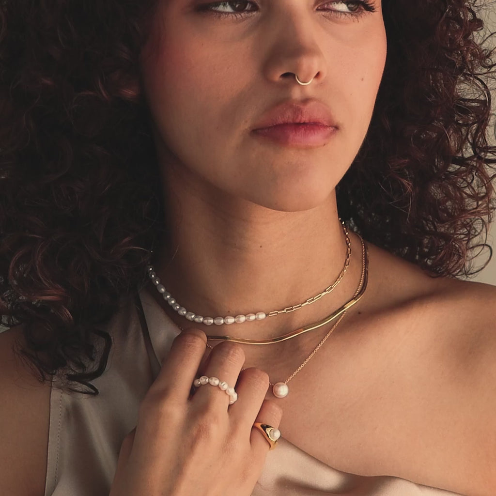 Collier pendentif en perles classique