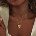 Video of model wearing our Fingerprint Heart Locket Necklace in Gold
