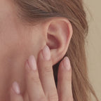 Huggies avec incrustation d'opale verte