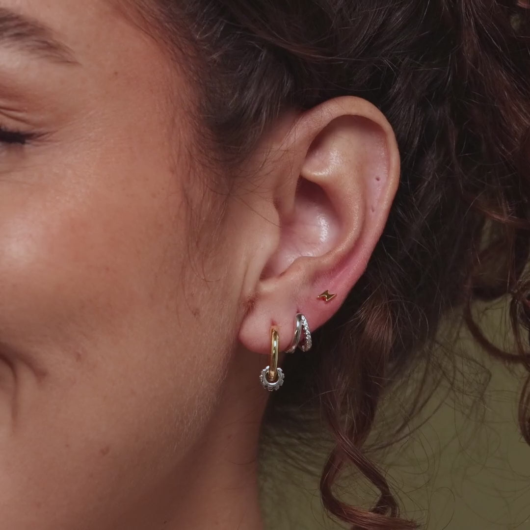 Video of a model wearing our Mixed Metal Pave Hoops in 18K Gold