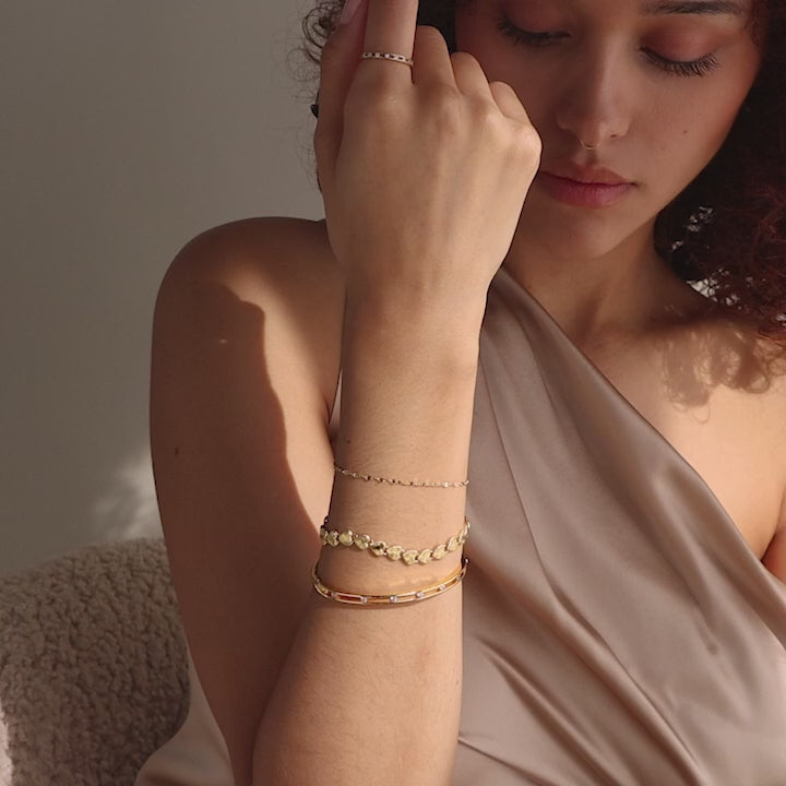 Bracelet à maillons en forme de cœur côtelé en or 18 carats