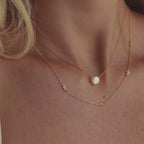 Collier Bow Station en or 18 carats