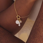 Breloque perle ronde en or 18 carats