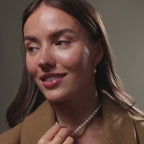 Boucles d'oreilles pendantes en perles et diamants