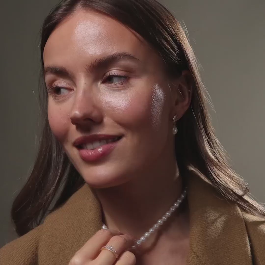 Boucles d'oreilles pendantes en perles et diamants