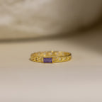 Baguette Birthstone Curb Ring in Amethyst for February, featuring a rectangular purple stone and curb-link band—an ideal piece of personalized jewelry on a neutral background.