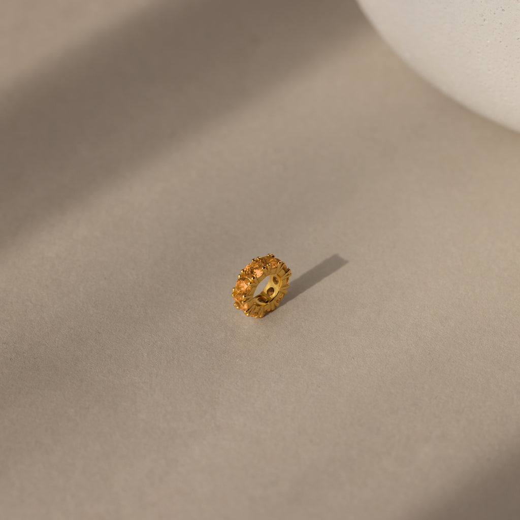 Infinity Topaz Charm