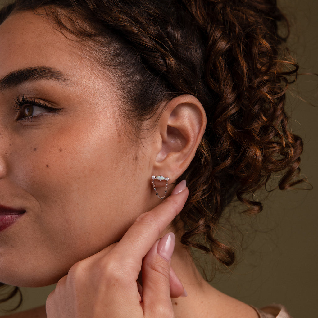 Model wearing our Opal & Diamond Chain Studs