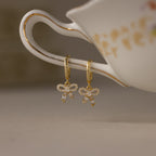 Pave Bow Charm Hoops in 18K Gold