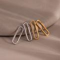 The Multipurpose Pave Link Clasp Set features three paperclip-shaped clasps in silver and 18k gold, accented with pavé diamonds, bringing effortless elegance to any jewelry look.